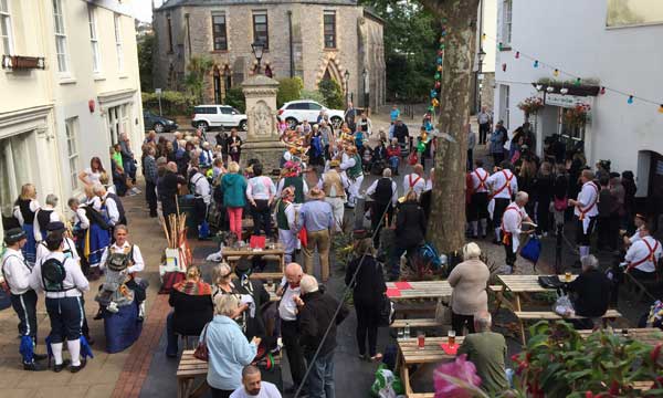 Morris Men perform outside at the Dartmouth Inn